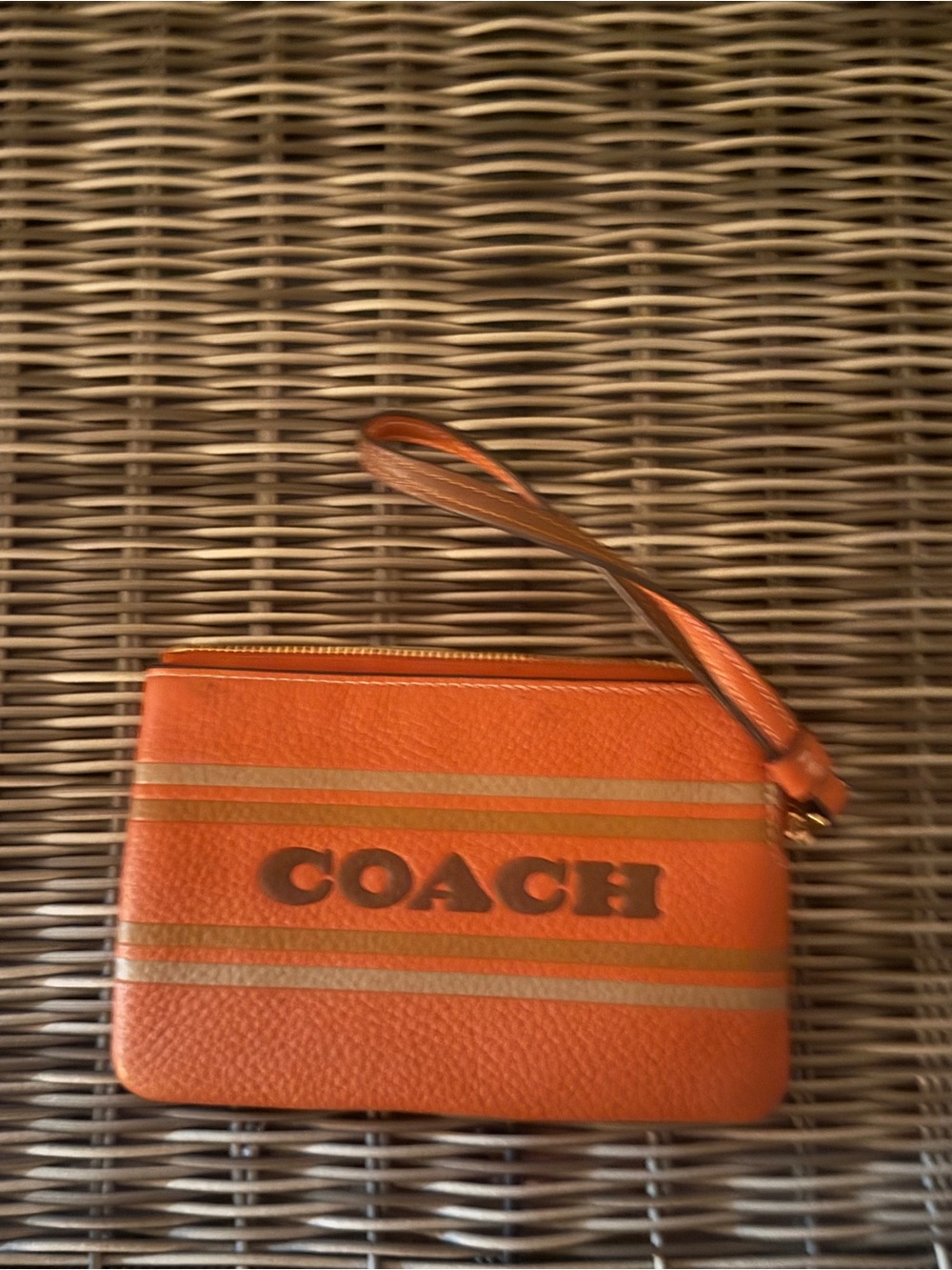Coach Orange Leather Wristlet with Gold Stripes